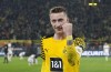 Dortmund's Marco Reus celebrates after he scored his side's decisive second goal during the German Bundesliga soccer match between Borussia Dortmund and VfB Stuttgart in Dortmund, Germany, Saturday, Nov. 20, 2021. (AP Photo/Martin Meissner)
