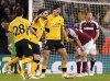 Wolverhampton Wanderers' Raul Jimenez, center, celebrates scoring their side's first goal during the Premier League match at Molineux Stadium, Wolverhampton, Britain, Saturday Nov. 20, 2021. (Tim Goode/PA via AP)