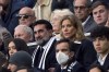 Newcastle United Chairman Yasir Al-Rumayyan, center left, and Club Director Amanda Staveley sit in the stands during the English Premier League soccer match between Newcastle United and Brentford at St. James' Park, Newcastle, England, Saturday Nov. 20, 2021. (Owen Humphreys/PA via AP)