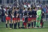 Washington Spirit's Tegan McGrady (9) and Andi Sullivan (12) kneel during the national anthem prior to the NWSL Championship soccer match against the Chicago Red Stars, Saturday, Nov. 20, 2021, in Louisville, Ky. (AP Photo/Jeff Dean)