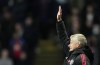 Manchester United's manager Ole Gunnar Solskjaer gives instructions to his players during the English Premier League soccer match between Watford and Manchester United at Vicarage Road, Watford, England, Saturday, Nov. 20, 2021. (AP Photo/Frank Augstein)