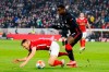 Freiburg's Maximilian Eggestein and Frankfurt's Evan Ndicka, right, challenge for the ball during the German Bundesliga soccer match between SC Freiburg and Eintracht Frankfurt in Freiburg, Germany, Sunday, Nov. 21, 2021. (Philipp Von Ditfurth/dpa via AP)