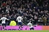 Tottenham's Sergio Reguilon, right, celebrates after scoring his side's second goal during the English Premier League soccer match between Tottenham Hotspur and Leeds United at Tottenham Hotspur Stadium in London, England, Sunday, Nov. 21, 2021. (AP Photo/Ian Walton)