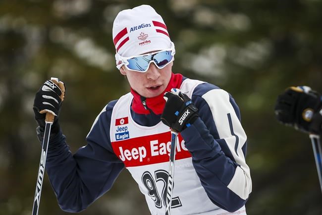 Canadian Cross-Country Ski Team member Xavier McKeever takes a break during early season training in Canmore, Alta., on October 19, 2020. THE CANADIAN PRESS/Jeff McIntosh