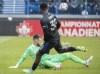 CF Montreal's Romell Quioto moves in on Toronto FC's goalkeeper Quentin Westberg during fist half Canadian Championship soccer action in Montreal, Sunday, November 21, 2021. THE CANADIAN PRESS/Graham Hughes