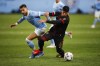 New York City FC's Valentín Castellanos, left, and Atlanta United defender Alan Franco (6) battle for the ball during the first half of an MLS soccer match at Yankee Stadium, Sunday, Nov. 21, 2021, in New York. (AP Photo/Eduardo Munoz Alvarez)