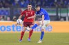 Italy's Jorginho passes the ball as Switzerland's Remo Freuler closes him down during the World Cup 2022 group C qualifying soccer match between Italy and Switzerland at Rome's Olympic stadium, Friday, Nov. 12, 2021. (AP Photo/Gregorio Borgia)