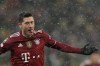 Bayern's Robert Lewandowski celebrates his goal against Dynamo Kyiv during the Champions League group E soccer match between Dynamo Kyiv and Bayern Munich, at the Olimpiyskiy Stadium in Kyiv, Ukraine, Tuesday, Nov. 23, 2021. (AP Photo/Efrem Lukatsky)