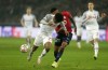 Salzburg's Karim Adeyemi, left, and Lille's Reinildo Mandava challenge for the ball during the Champions League group G soccer match between OSC Lille and RB Salzburg at the Stade Pierre Mauroy - Villeneuve d'Ascq in Lille, France, Tuesday, Nov. 23, 2021. (AP Photo/Michel Spingler)