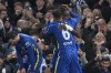 Chelsea's Trevoh Chalobah, right, celebrates with his teammate Thiago Silva after scoring his side's opening goal during the Champions League group H soccer match between Chelsea and Juventus at Stamford Bridge stadium in London, Tuesday, Nov. 23, 2021. (AP Photo/Matt Dunham)