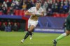 Sevilla's Joan Jordan celebrates after scoring his team's first goal during the Champions League group G soccer match between Sevilla and Wolfsburg at the Ramon Sanchez Pizjuan stadium in Seville, Spain, Tuesday, Nov. 23, 2021. (AP Photo/Miguel Morenatti)