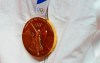 The gold medal of United States's Diana Taurasi hangs as she stands on the podium during the medal ceremony for women's basketball at the 2020 Summer Olympics, in Saitama, Japan, Sunday, Aug. 8, 2021. THE CANADIAN PRESS/AP-Charlie Neibergall