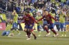 Real Salt Lake players celebrate the team's win over the Seattle Sounders in a penalty-kick shootout in an MLS first-round playoff soccer match Tuesday, Nov. 23, 2021, in Seattle. (AP Photo/Ted S. Warren)