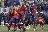Real Salt Lake players celebrate a win over the Seattle Sounders on penalty kicks in an MLS soccer playoff match Tuesday, Nov. 23, 2021, in Seattle. (AP Photo/Ted S. Warren)