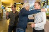 NRK journalists Halvor Ekeland, right, and Lokman Ghorbani, left, are welcomed back by head of NRK sports Egil Sundvor upon their arrival from Qatar, at the airport in Gardermoen, Norway. Security forces in Qatar detained two journalists from Norwegian state television for over 30 hours and deleted footage they gathered at a migrant labor camp as they tried to report on worker issues ahead of the FIFA 2022 World Cup, authorities said Wednesday. Qatar's government later accused Ekeland and Ghorbani of “trespassing on private property and filming without a permit” as the two returned early Wednesday to Norway following their arrest. Norwegian Prime Minister Jonas Gahr Stoere responded by saying their arrest was “unacceptable.”(Hakon Mosvold Larsen/NTB Scanpix via AP)