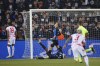 Leipzig's Christopher Nkunku, left, scores during the Champions League Group A soccer match between Club Brugge and RB Leipzig at the Jan Breydel stadium in Bruges, Belgium, Wednesday, Nov. 24, 2021. (AP Photo/Olivier Matthys)