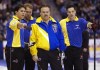 Alberta's David Nedohin (left), Marcel Rocque, skip Randy Ferbey, and Scott Pfeifer discuss a shot during their 7-5 win over Ontario at the Canadian men's curling championship in Saskatoon, Monday March 8, 2004. When Team Homan coach Marcel Rocque walked into SaskTel Centre for Canada’s Olympic curling trials, the memories from the 2004 men’s national championship final came rushing back. THE CANADIAN PRESS/Adrian Wyld