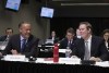 Edward Rogers, right, Chairman of Rogers Communications, and Brad Shaw, Chairman and CEO of Shaw Communications, chat before the start of the CRTC hearing looking into the merge of the two communication companies in Gatineau, Quebec, on Monday November 22, 2021. THE CANADIAN PRESS/Fred Chartrand