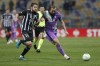 Mura's Nik Lorbek, left, is challenged by Tottenham's Harry Kane during the Europa Conference League match between Mura and Tottenham Hotspur in Maribor, Slovenia, Thursday, Nov. 25, 2021. (AP Photo)