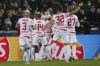 Leipzig's Emil Forsberg, center, is cheered by teammates after scoring on a penalty kick during the Champions League Group A soccer match between Club Brugge and RB Leipzig at the Jan Breydel stadium in Bruges, Belgium, Wednesday, Nov. 24, 2021. (AP Photo/Olivier Matthys)