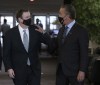 Brad Shaw Chairman, right to left, and CEO of Shaw Communications chats with Edward Rogers, Chairman of Rogers Communications, during a break at ther CRTC hearing on Monday November 22, 2021. THE CANADIAN PRESS/Fred Chartrand