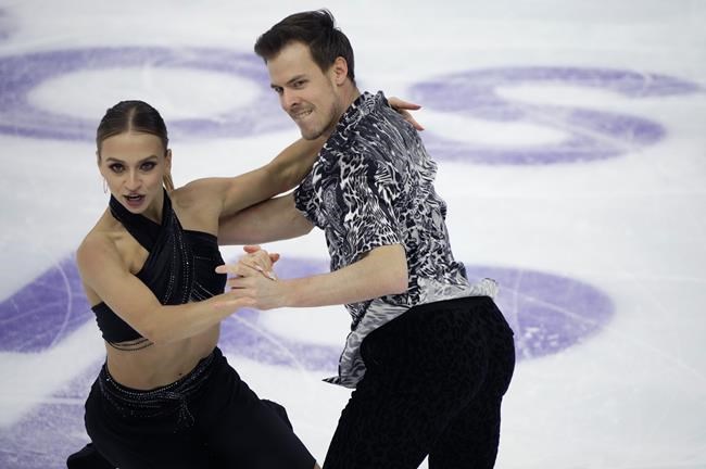 Russia's Victoria Sinitsina and Nikita Katsalapov perform in the ice dance, rhythm dance program during the ISU Grand Prix of Figure Skating Rostelecom Cup in Sochi, Russia, Friday, Nov. 26, 2021. (AP Photo/Alexander Zemlianichenko)