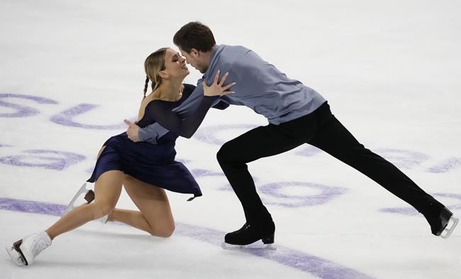 Russia's Victoria Sinitsina and Nikita Katsalapov perform in the ice dance free dance skating program during the ISU Grand Prix of Figure Skating Rostelecom Cup in Sochi, Russia, Saturday, Nov. 27, 2021. (AP Photo/Alexander Zemlianichenko)
