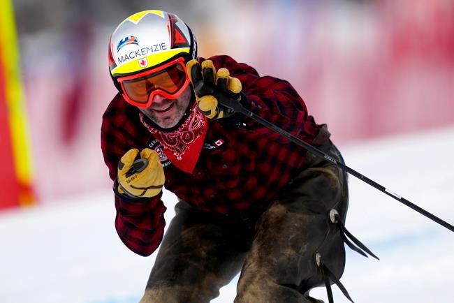 Manuel Osborne-Paradis flies down the course on his retirement run prior to FIS downhill skiing race action, in Lake Louise, Alta., Saturday, Nov. 27, 2021. THE CANADIAN PRESS/Frank Gunn