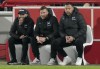 Berlin's head coach Pal Dardai, right, and the assistant coaches attend the German Bundesliga soccer match between 1. FC Union Berlin and Hertha BSC Berlin in Berlin, Germany, Saturday, Nov. 20, 2021. Union defeated Hertha by 2-0. (AP Photo/Michael Sohn)