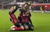 Leverkusen's match winner Moussa Diaby, center, celebrates beside Leverkusen's Nadiem Amiri, right, and Leverkusen's Florian Wirtz, left, after he scored his side's third goal during the Europa League Group G soccer match between Bayer Leverkusen and Celtic in Leverkusen, Germany, Thursday, Nov. 25, 2021. (AP Photo/Martin Meissner)