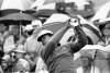 FILE - Lee Elder watches the flight of his ball as he tees off in the first round of play at the Masters in Augusta, Ga., in this April 10, 1975, file photo. Elder broke down racial barriers as the first Black golfer to play in the Masters and paved the way for Tiger Woods and others to follow. The PGA Tour confirmed Elder’s death, which was first reported by Debert Cook of African American Golfers Digest. No cause or details were immediately available, but the tour said it spoke with Elder's family. He was 87. (AP Photo/File)