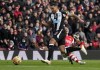 Newcastle's Jamaal Lascelles, left, duels for the ball with Arsenal's Gabriel Martinelli during the English Premier League soccer match between Arsenal and Newcastle United at Emirates stadium in London, Saturday, Nov. 27, 2021. (AP Photo/Kirsty Wigglesworth)