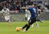 Inter Milan's Lautaro Martinez scores on a penalty kick his side's second goal during the Serie A soccer match between Inter Milan and Spezia at the San Siro Stadium, in Milan, Italy, Wednesday, Dec. 1, 2021. (AP Photo/Luca Bruno)