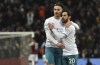 Manchester City's Jack Grealish, left, and Manchester City's Bernardo Silva react after the English Premier League soccer match between Aston Villa and Manchester City at Villa Park in Birmingham, England, Wednesday, Dec. 1, 2021. (AP Photo/Rui Vieira)