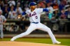 FILE - New York Mets' Marcus Stroman pitches during the first inning of the team's baseball game against the St. Louis Cardinals on Sept. 14, 2021, in New York. The Chicago Cubs landed one of the top remaining free agent starters, agreeing to a deal with Stroman on Wednesday, Dec. 1. Stroman announced he's heading to Chicago in a series of tweets a few hours before the Collective Bargaining Agreement between the players and owners was set to expire. (AP Photo/Frank Franklin II, File)