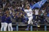 FILE - Los Angeles Dodgers' Chris Taylor (3) celebrates as he runs the bases after hitting a home run during the ninth inning to give the Dodgers the win in a National League Wild Card playoff baseball game against the St. Louis Cardinals on Oct. 6, 2021, in Los Angeles. The Dodgers are bringing back versatile All-Star Taylor, agreeing to a $60 million, four-year deal with a club option Wednesday night, Dec. 1. (AP Photo/Marcio Jose Sanchez, File)