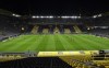 FILE - Players warm up in a stadium without fans prior to the the German Bundesliga soccer match between Borussia Dortmund and Bayern Munich in Dortmund, Germany, Saturday, Nov. 7, 2020. One year late, it is unclear how many fans will be allowed for the Bundesliga clash between Dortmund and Bayern on Saturday, as the BVB has precautionary cancelled all tickets for the match due to the coronavirus pandemic. (AP Photo/Martin Meissner, File)