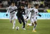 Canada's Tajon Buchanan (11) is chased by Mexico players during World Cup Qualifiers in Edmonton, Tuesday, Nov. 16, 2021.&nbsp;Buchanan is leaving Major League Soccer as an all-star. THE CANADIAN PRESS/Jason Franson