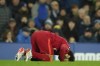 Liverpool's Mohamed Salah celebrates after scoring his side's second goal during the English Premier League soccer match between Everton and Liverpool at Goodison Park in Liverpool, England, Wednesday, Dec. 1, 2021. (AP Photo/Jon Super)