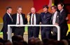 FILE - Legendary 1954 world champion Horst Eckel, center, poses behind the trophy with coach legend Otto Rehagel, museum director Manuel Neukirchner, German national head coach Joachim Loew, 1980 European champion keeper Harald Schumacher and team manager Olvier Bierhoff , from left, at the opening of the German football museum in Dortmund, Germany, Friday, Oct. 23, 2015. The last surviving member of West Germany’s 1954 World Cup-winning team Horst Eckel has died at the age of 89. Eckel was one of only two West German players to play in every match as the team completed the “Wonder of Bern” by beating pre-tournament favorite Hungary 3-2 in the final. (AP Photo/Martin Meissner, File)