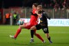 Union's Rani Khedira, left, in action against Leipzig's Konrad Laimeriday during Germany's Bundesliga soccer match between Union Berlin and Leipzig in Berlin, Friday, Dec. 3, 2021. (Andreas Gora/dpa via AP)