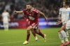 Brest's Franck Honorat celebrates after scoring his side's second goal during the French League One soccer match between Marseille and Brest at the Veldrome stadium in Marseille, France, Saturday, Dec. 4, 2021. (AP Photo/Daniel Cole)