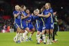 Chelsea's Ji So-yun, second right and Magdalena Eriksson, right, celebrate, after the women's FA Cup soccer final match between Arsenal and Chelsea, at Wembley Stadium, in London, Sunday, Dec. 5, 2021. (Zac Goodwin/PA via AP)