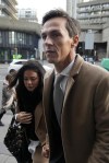 Danish golfer Thorbjorn Olesen, right, arrives for a hearing in his court case at Aldersgate House, in London, Wednesday, Dec. 8, 2021. Olesen appeared in a London court on Monday facing allegations he grabbed a woman’s breast, pushed a member of the cabin crew and urinated on a first-class passenger’s seat on a flight to Britain from a World Golf Championships event in Tennessee in 2019. (AP Photo/Frank Augstein)