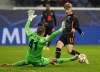 Chelsea's Timo Werner, right, kicks the ball ahead of Zenit's goalkeeper Mikhail Kerzhakov during the Champions League group H soccer match between Zenit St. Petersburg and Chelsea at the Gazprom Arena in St.Petersburg, Russia, Wednesday, Dec. 8, 2021. (AP Photo/Dmitry Lovetsky)