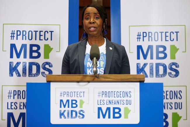 Manitoba Health and Seniors Care Minister Audrey Gordon addresses media pride to children receiving their first inoculations in the COVID-19 vaccination clinic at the Convention Centre in Winnipeg on Nov. 25, 2021. THE CANADIAN PRESS/John Woods