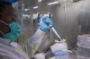 Puseletso Lesofi prepares to sequence COVID-19 Omicron samples at the Ndlovu Research Center in Elandsdoorn, South Africa on Wednesday Dec. 8, 2021. THE CANADIAN PRESS/AP-Jerome Delay