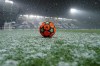 Snow falls over the pitch prior to the Champions League, group F soccer match between Atalanta and Villareal, at the Gewiss stadium in Bergamo, Italy, Wednesday, Dec. 8, 2021. (SpadaLaPresse via AP)