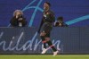 Lille's Jonathan David celebrates after scoring his side's second goal during the Champions League group G soccer match between VfL Wolfsburg and Lille OSC in Wolfsburg, Germany, Wednesday, Dec. 8, 2021. (AP Photo/Martin Meissner)