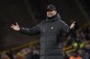 Liverpool's manager Jurgen Klopp gestures during the English Premier League soccer match between Wolverhampton Wanderers and Liverpool at the Molineux Stadium in Wolverhampton, England, Saturday, Dec. 4, 2021. (AP Photo/Rui Vieira)